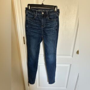 American Eagle High Rise Jegging Next Level Stretch • Size 4 Long • Dark Wash